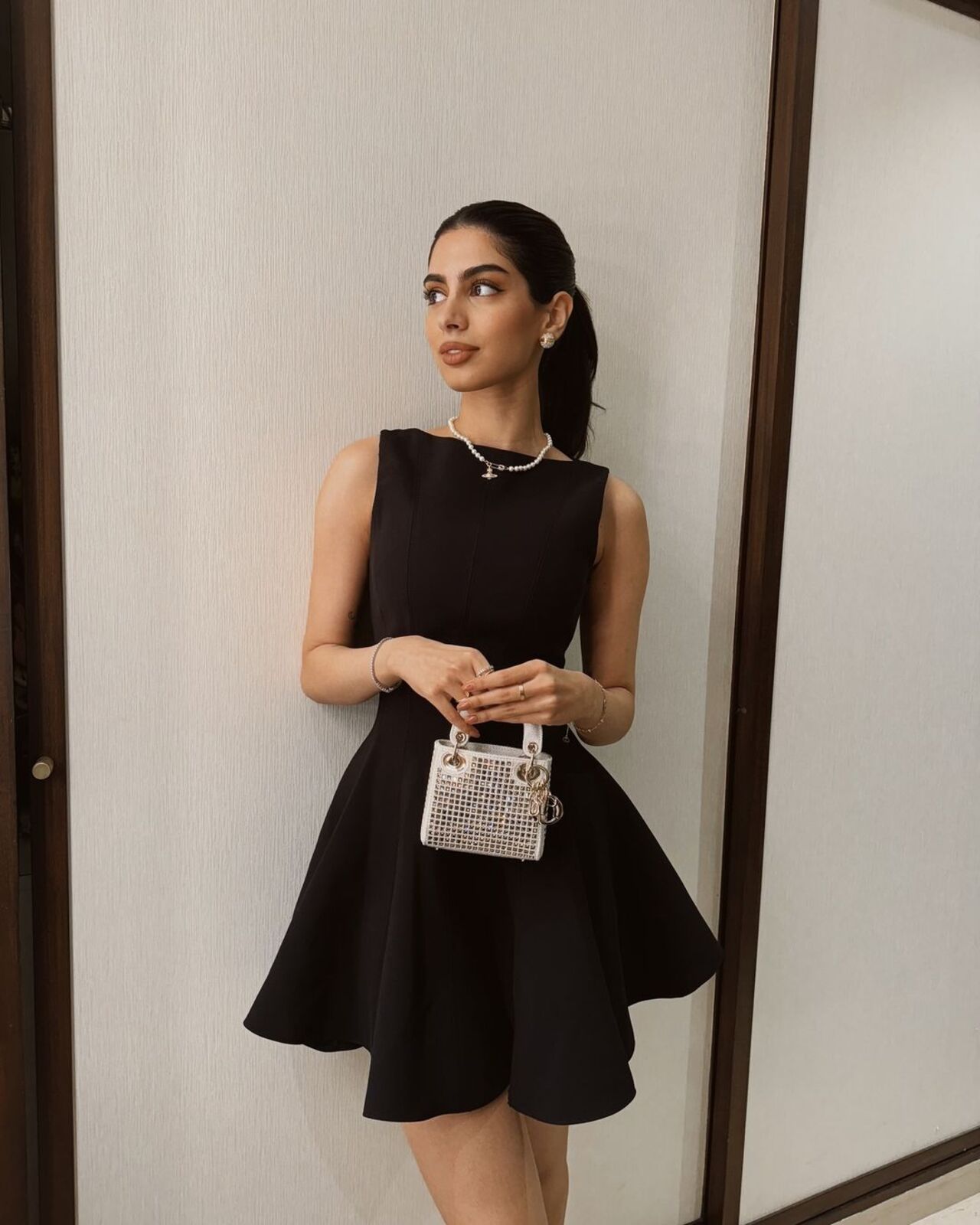 Khushi Kapoor went for this sharp triangular black dress for a movie night and we are loving this look